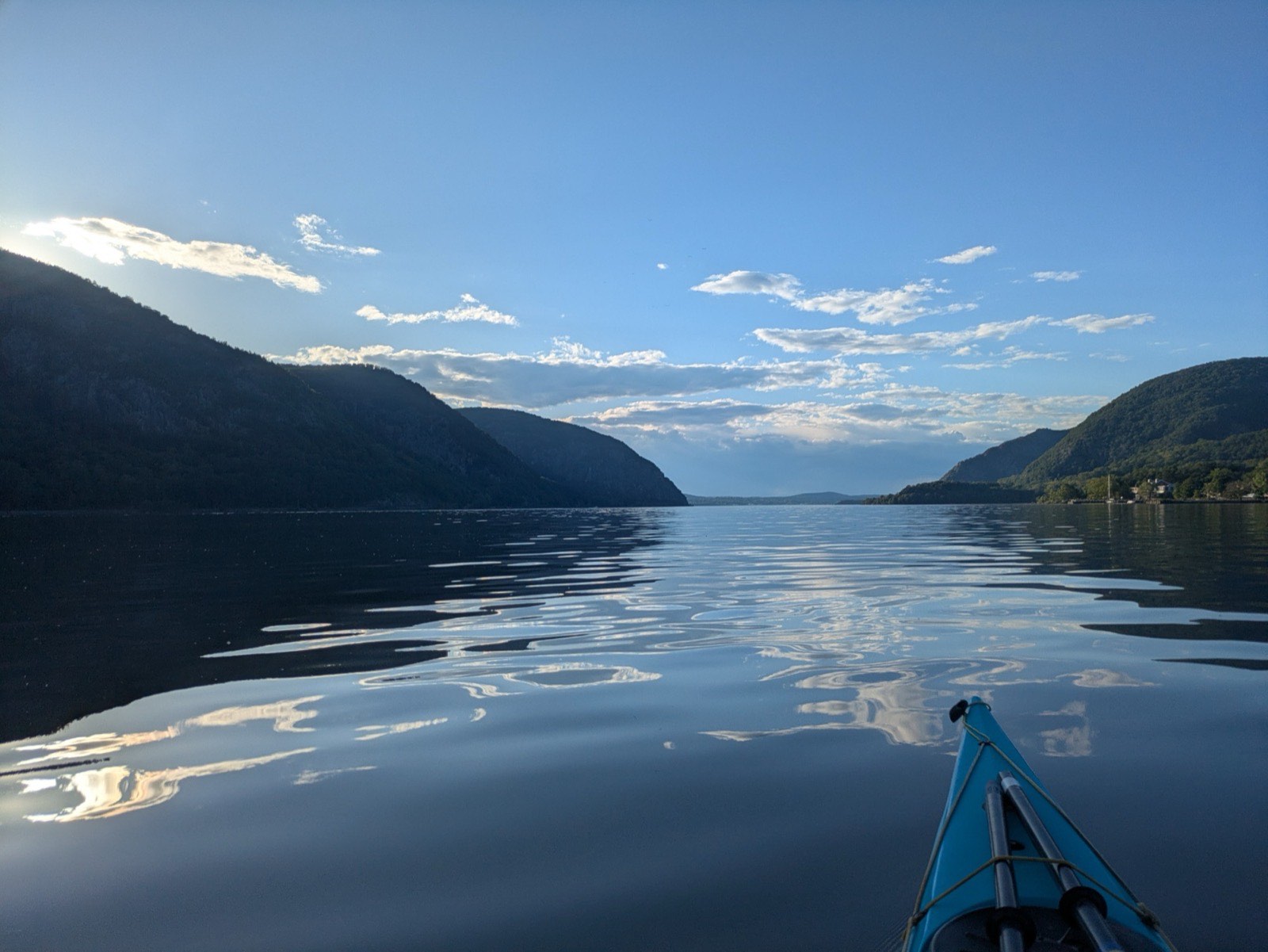 The Hudson River seen from a kayak at Cold Spring, looking downriver between Storm King and Breakneck Ridge on a calm morning